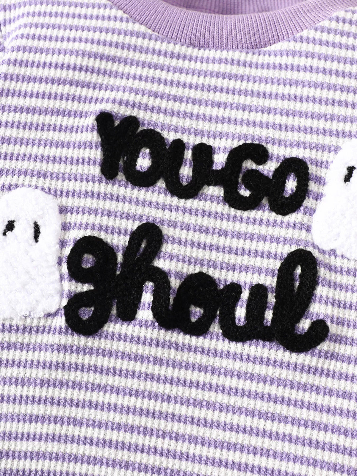 You Go ghoul lettering on purple-striped pajama fabric