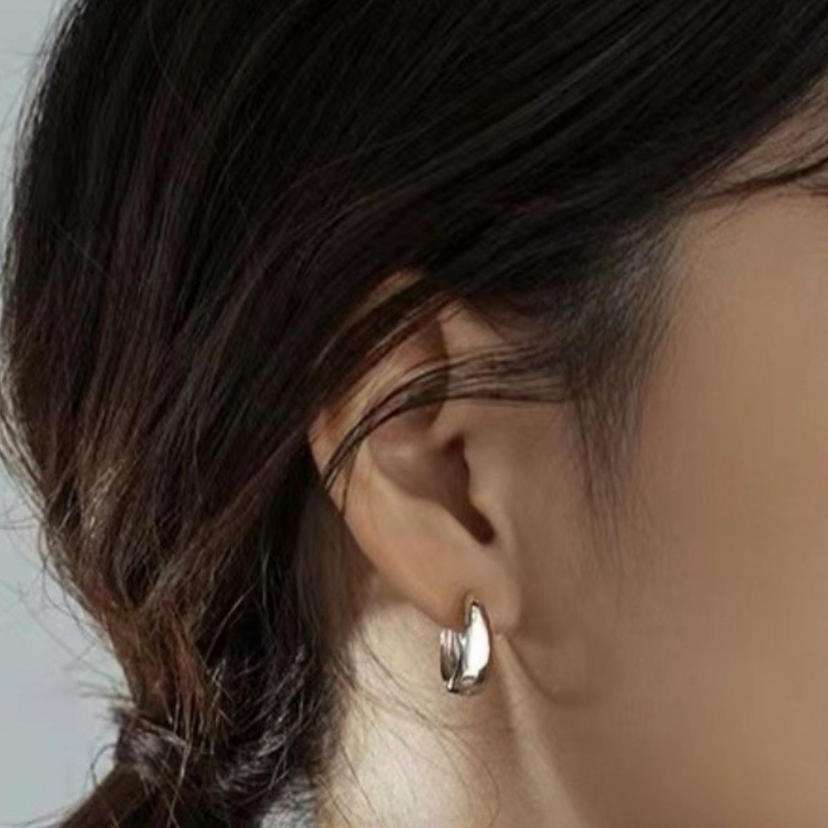 Rounded silver-tone hoop earrings