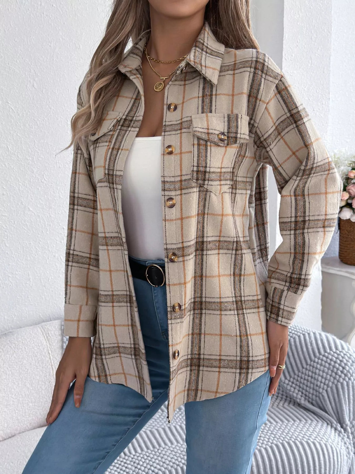 Apricot plaid button-down shacket with chest pockets, front view.