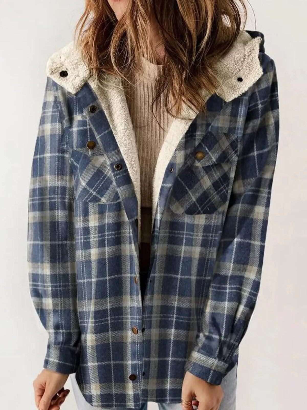 Blue plaid hooded jacket with cream plush lining, front view.