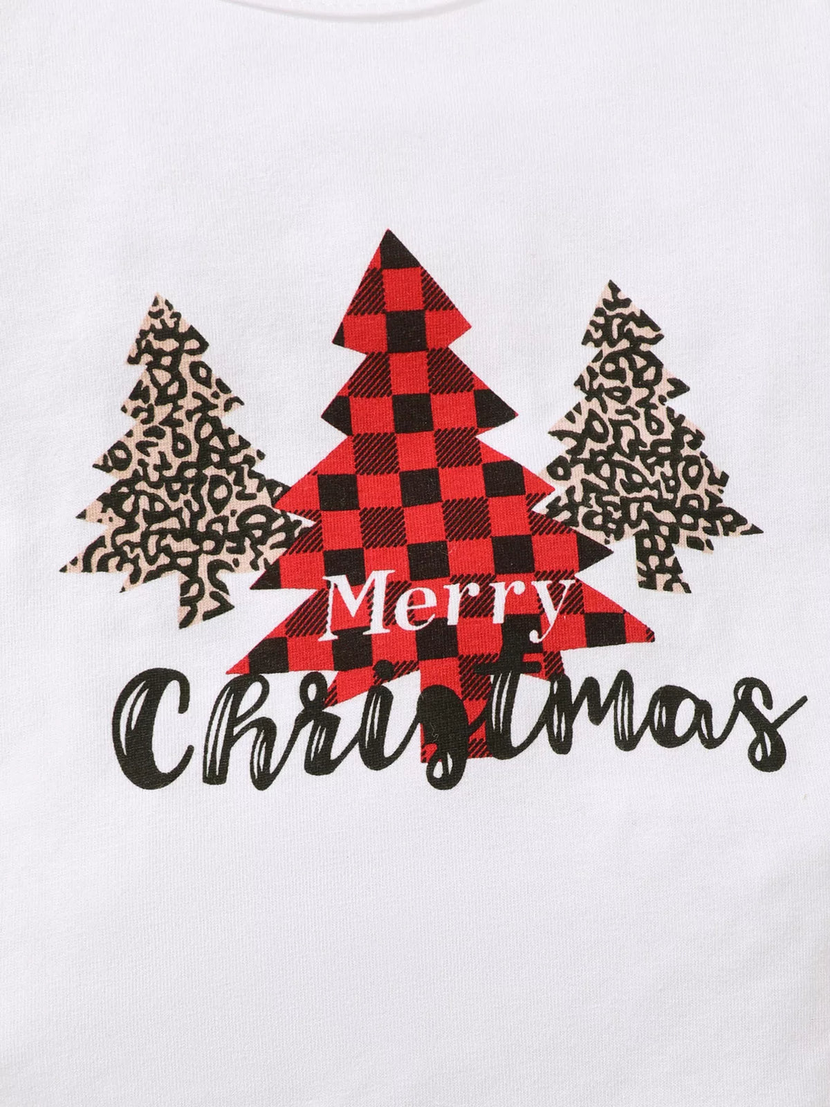 Close-up of the plaid and leopard-print Christmas trees and Merry Christmas lettering.