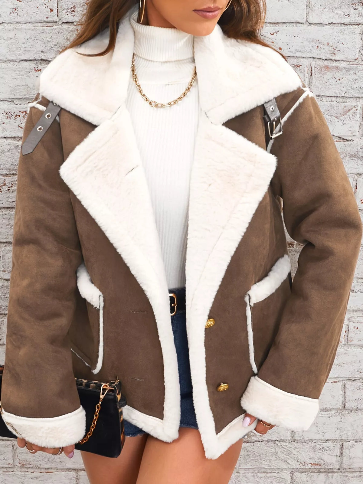 Brown jacket with wide white plush lapels, contrast trim and front pockets, front view.
