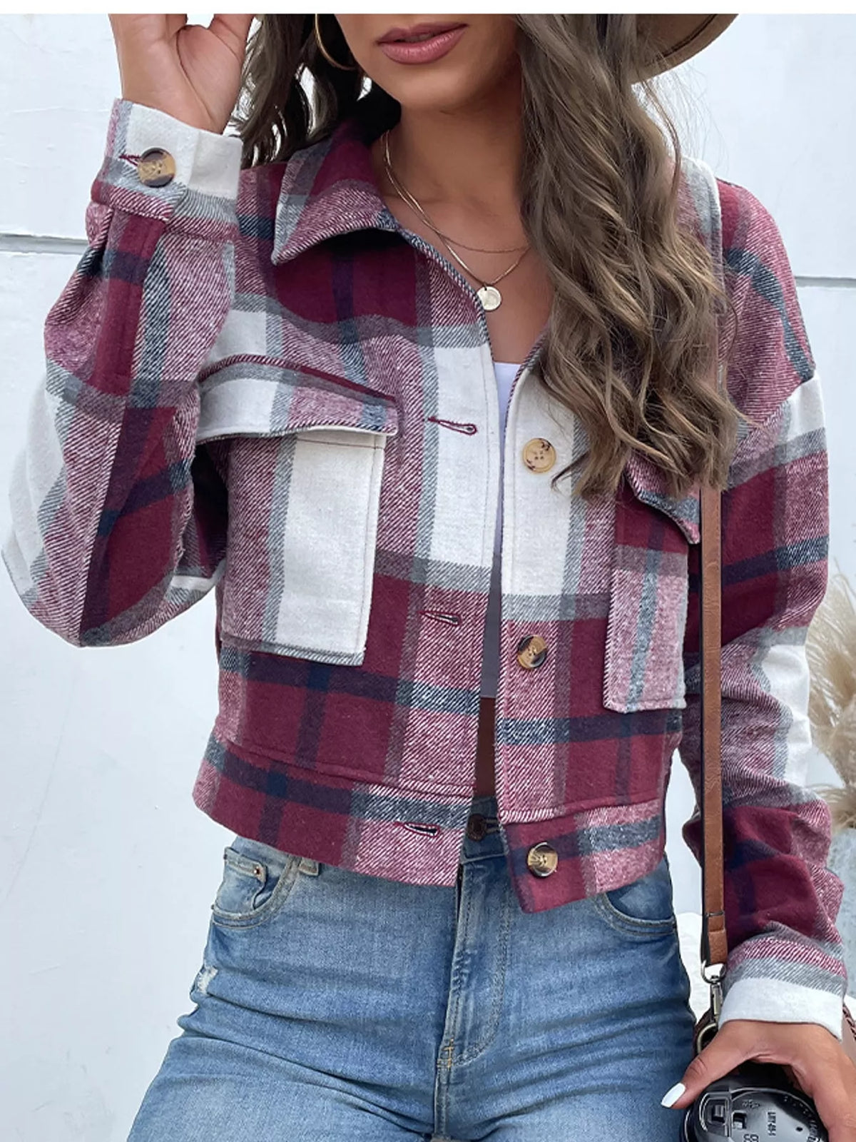 Burgundy color-block plaid cropped jacket with flap chest pockets, front view.