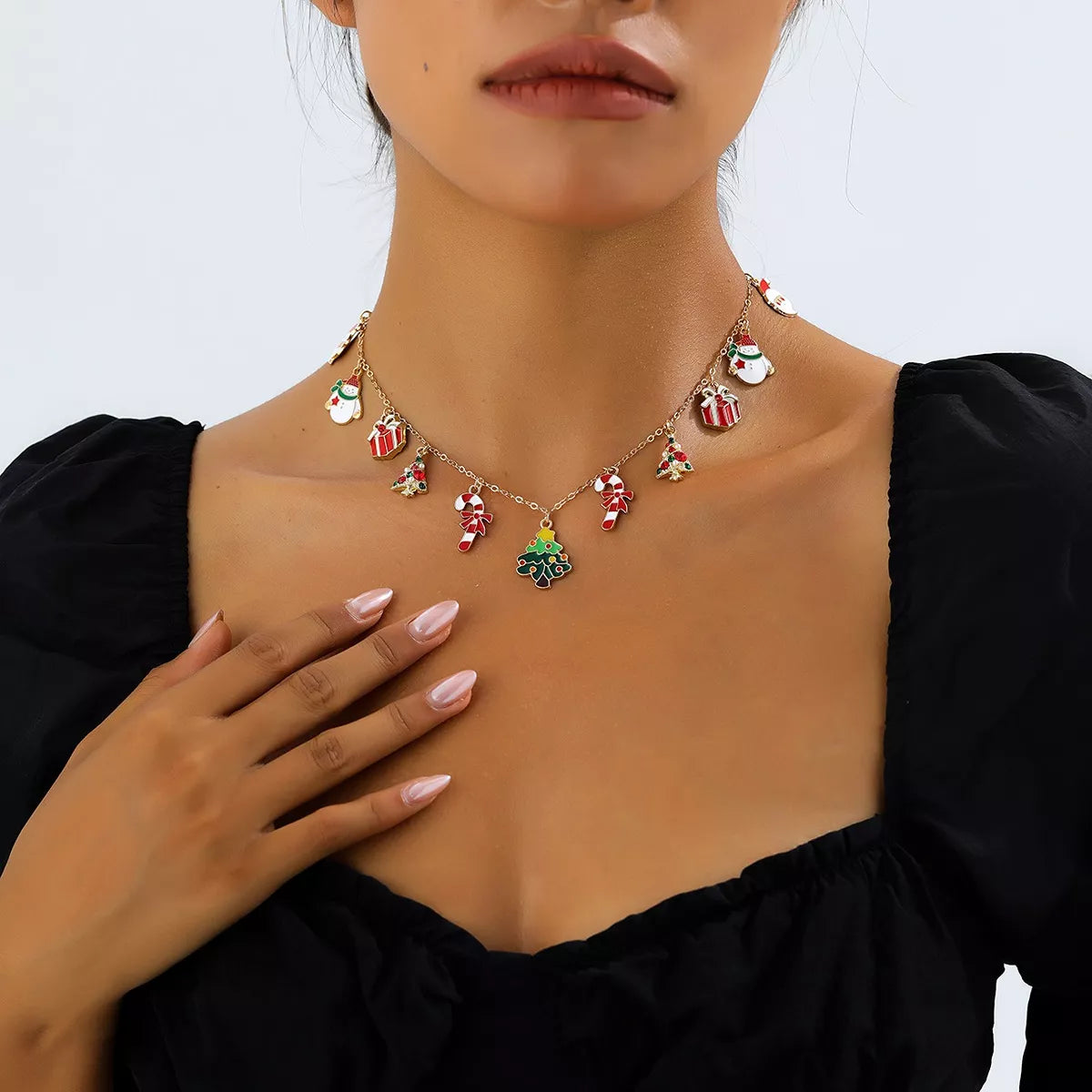 Gold-tone necklace with colorful Christmas charms
