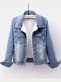 Light-wash denim jacket with white fleece lining, displayed on a hanger.