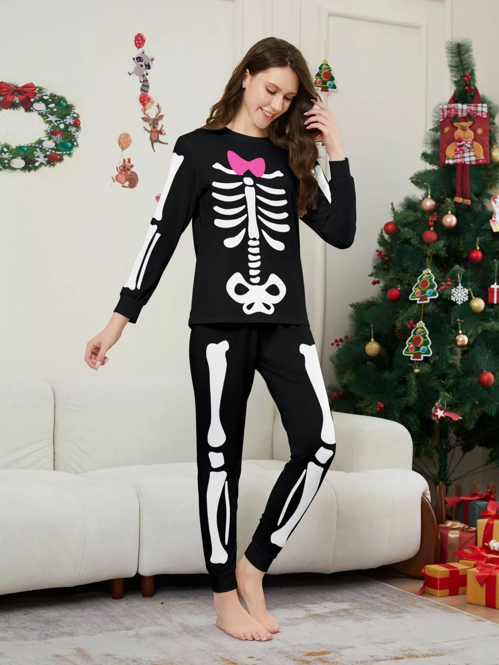 Front view of the women's black and white skeleton-print pajamas.