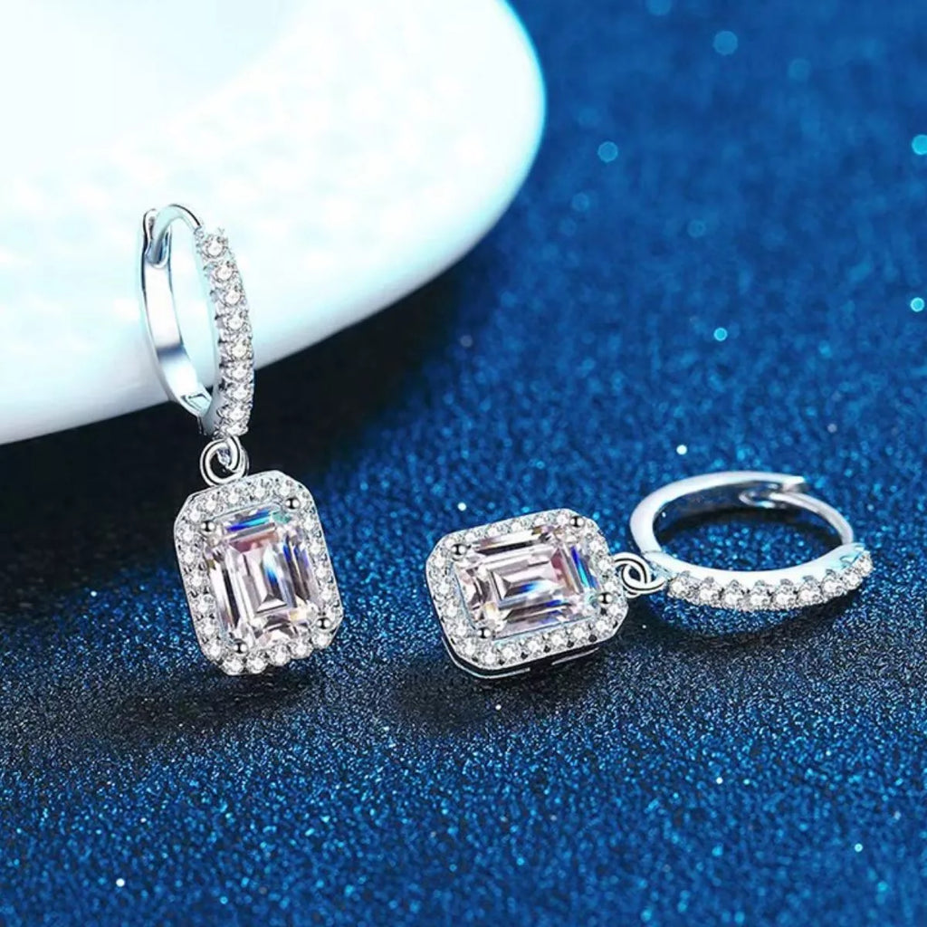 Silver-tone hoop earrings with rectangular halo stone drops — detail view