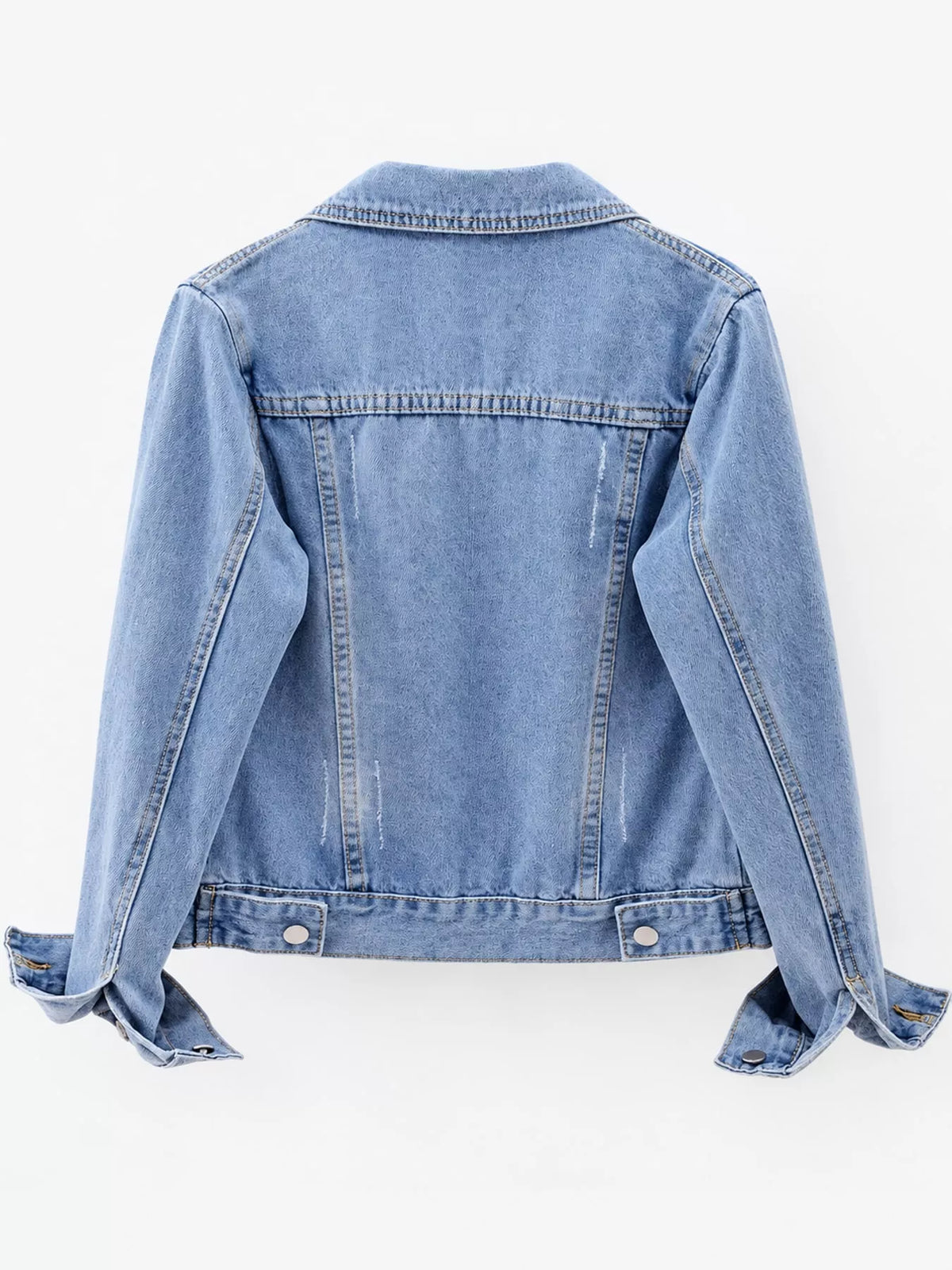 Back view of the light-wash denim jacket.