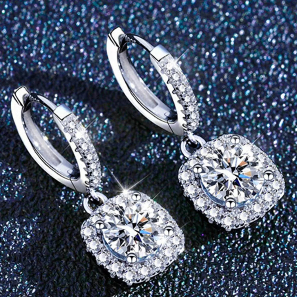 Silver-tone hoop earrings with square halo stone drops — detail view