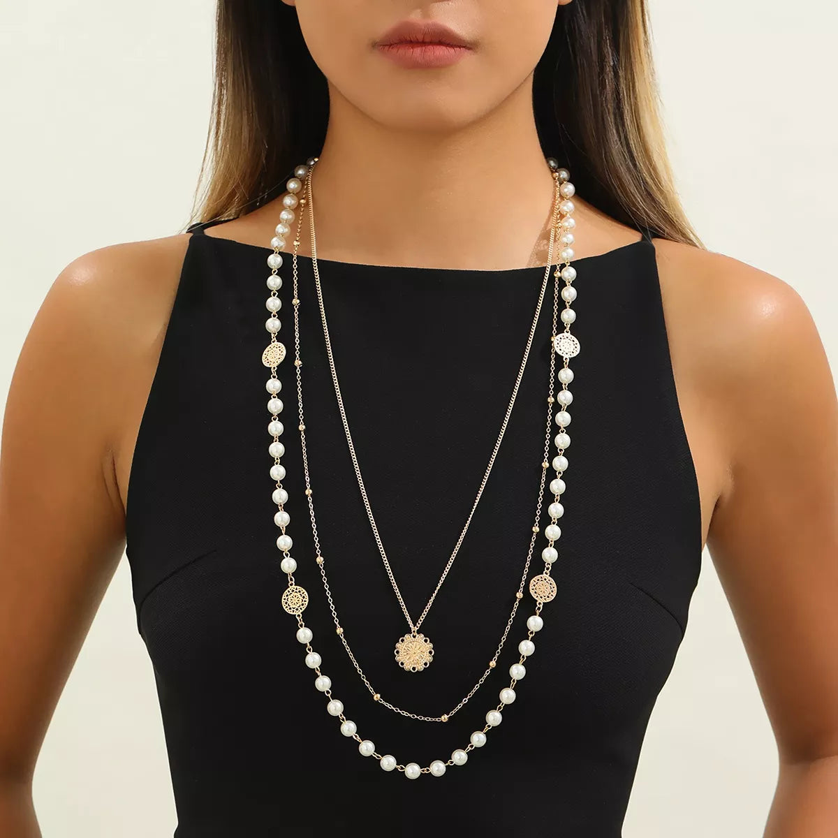 Layered pearl-like bead and coin pendant necklace