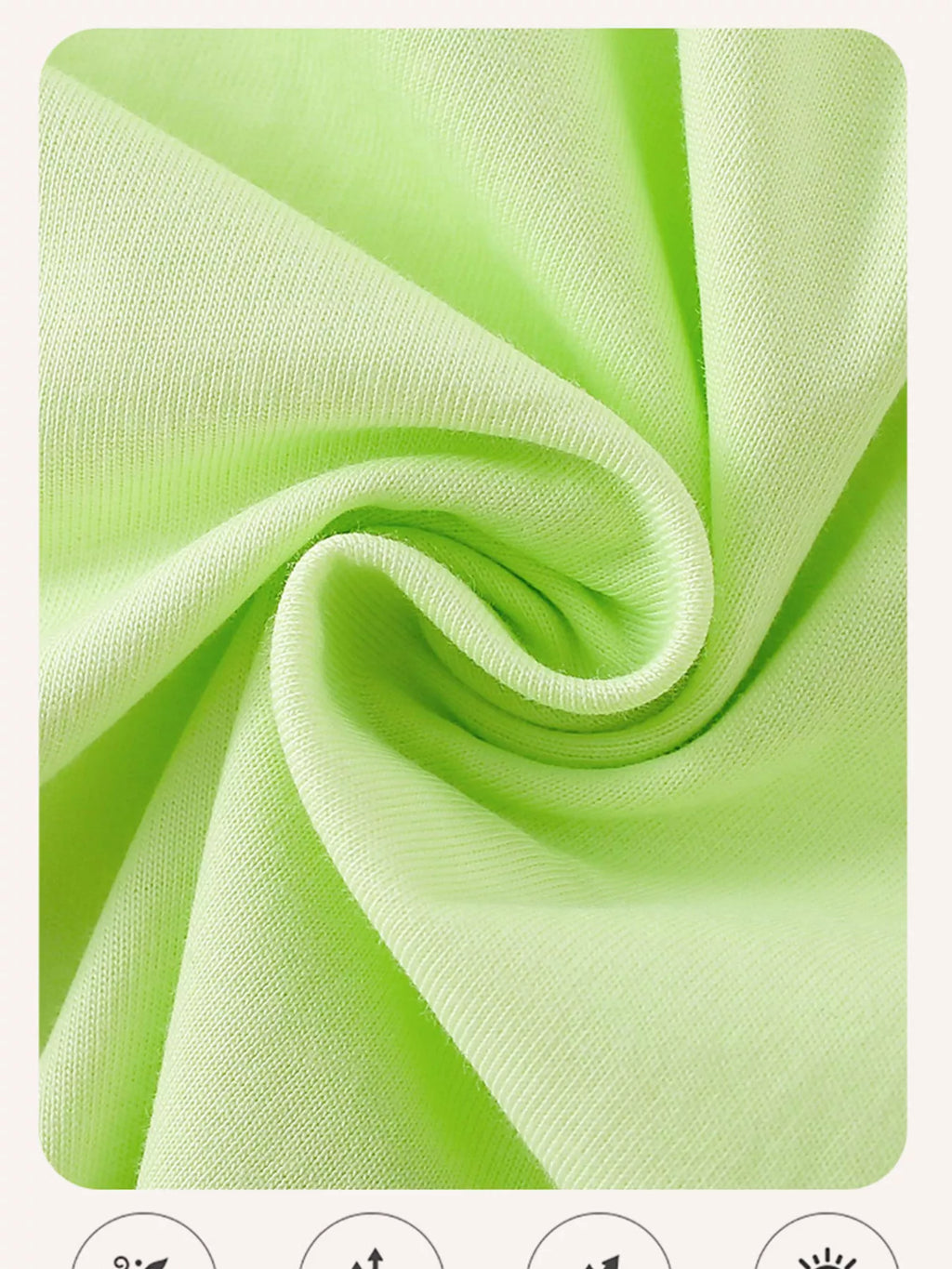 Folded light green fabric from the children's butterfly top.