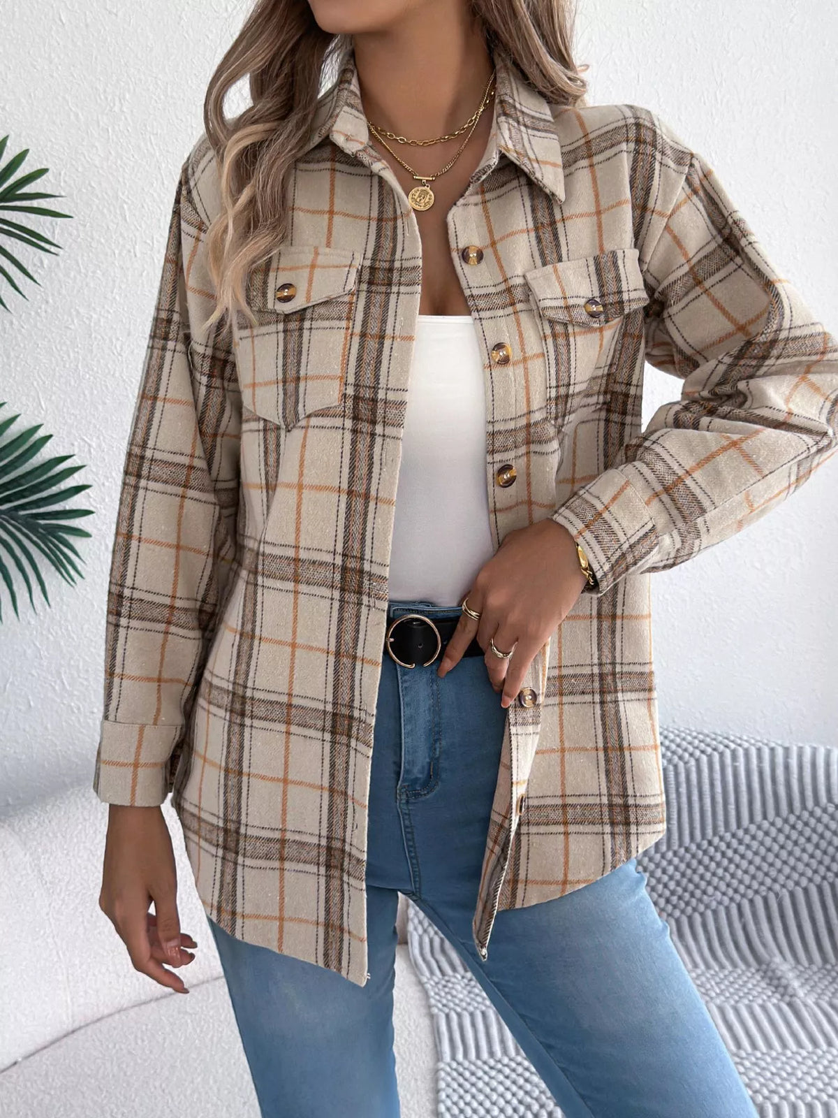 Apricot plaid button-down shacket with chest pockets, front view.