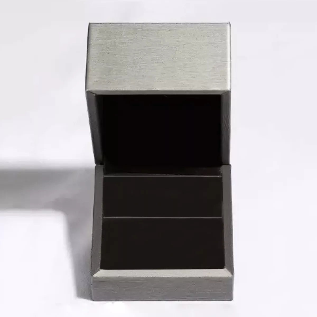 Open gray jewelry presentation box with black interior