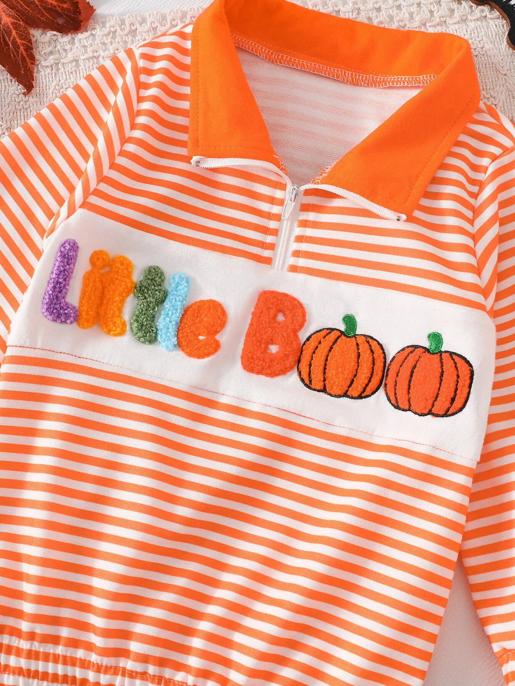 Front view of the orange striped Little Boo top with pumpkin graphics.