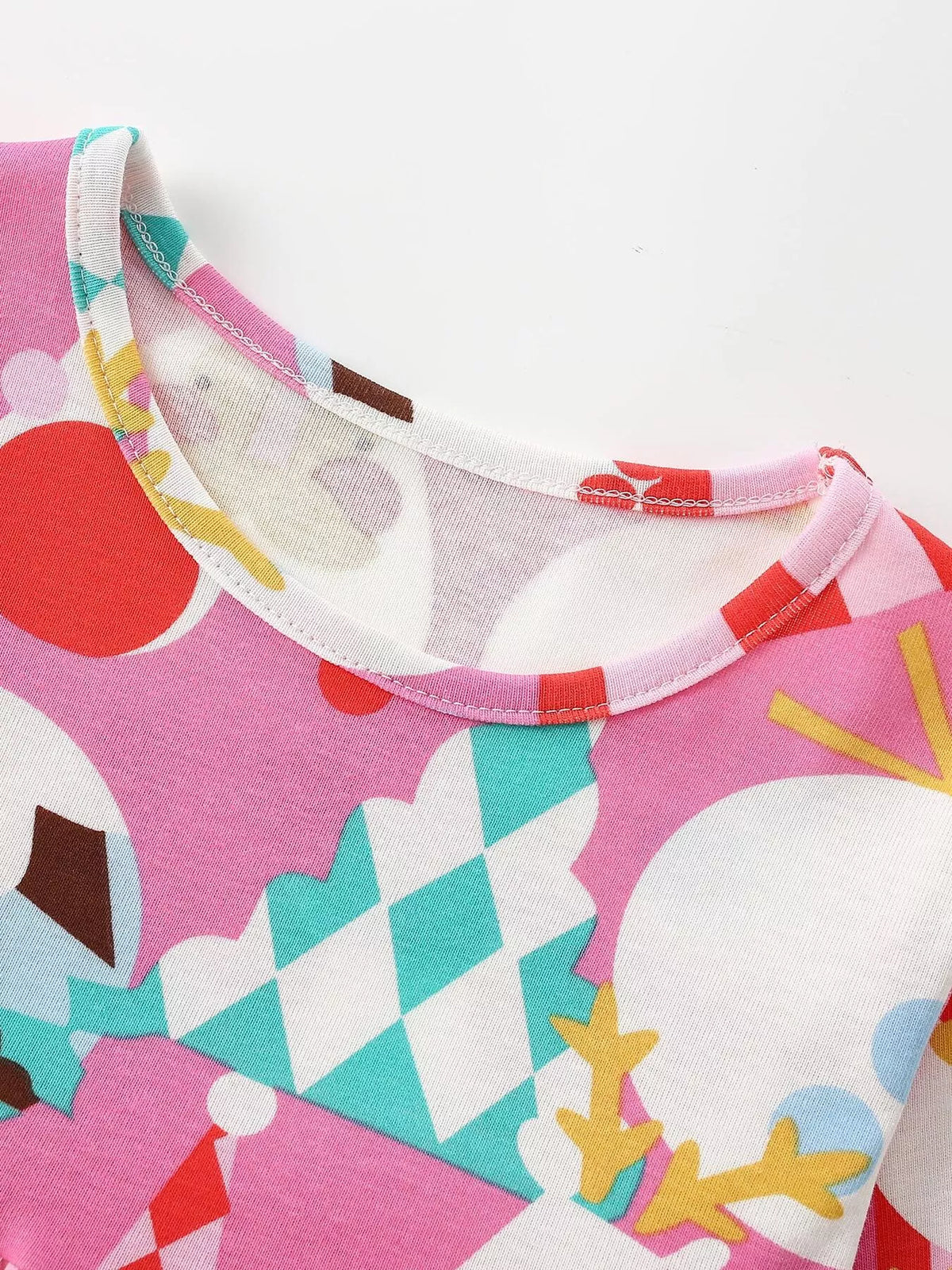 Round neckline and colorful ornament print on the pink Christmas dress