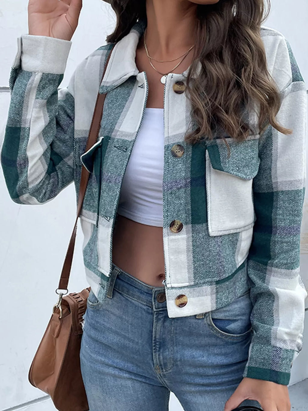 Green color-block plaid cropped jacket with flap chest pockets, front view.