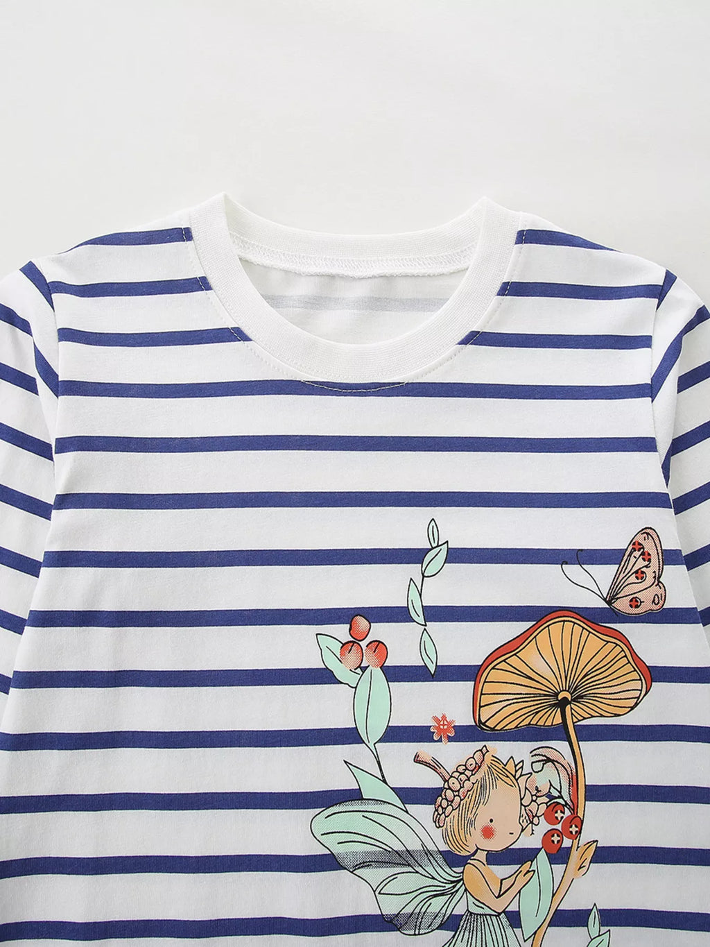 Navy-striped white long-sleeve top with colorful floral and bird embroidery