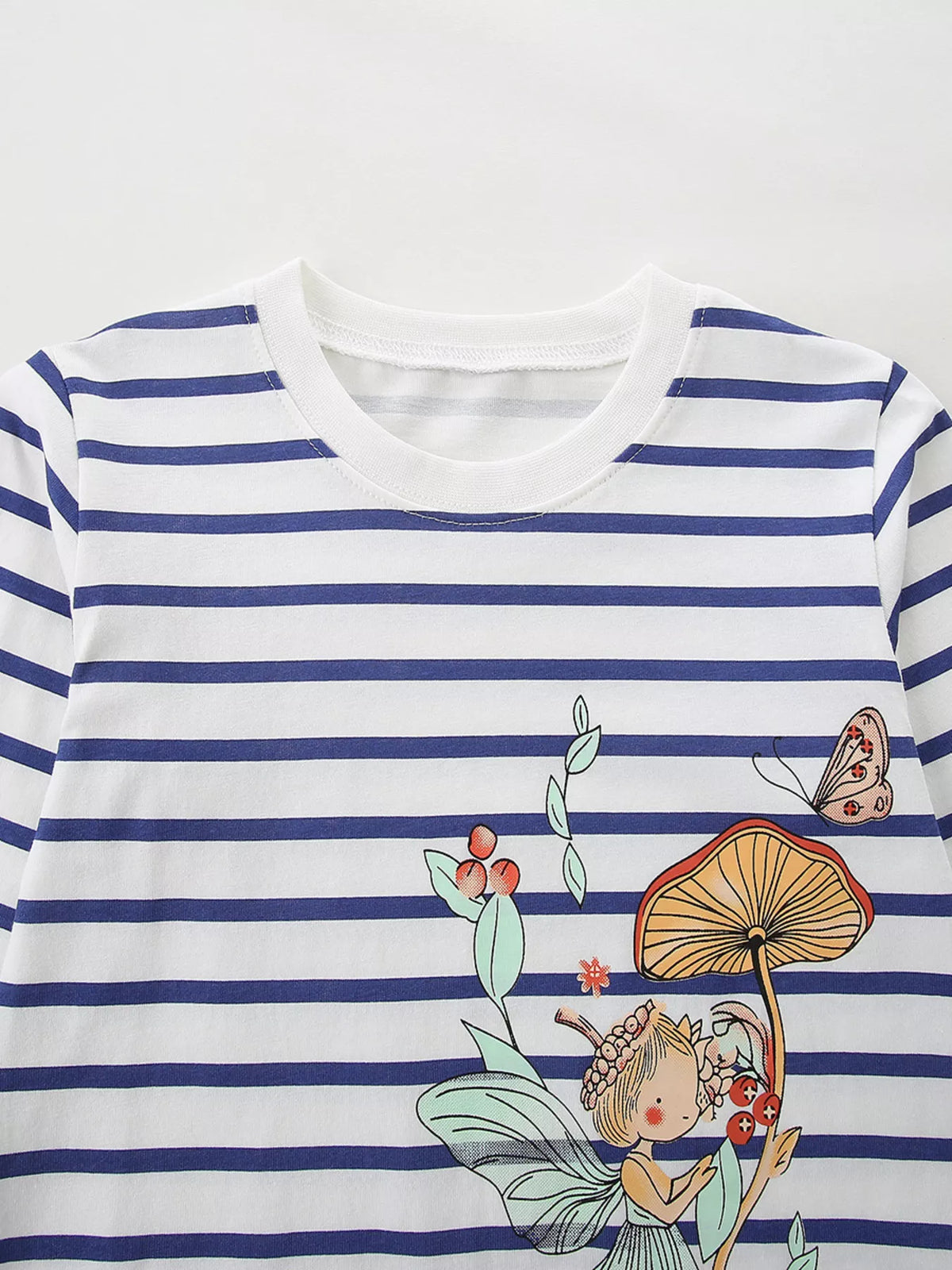 Navy-striped white long-sleeve top with colorful floral and bird embroidery