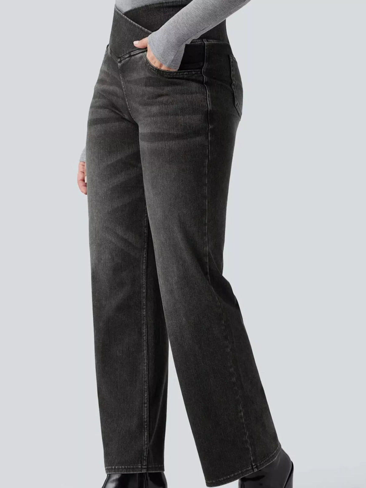 Black high-waisted crossover waistband straight-leg jeans — detail view