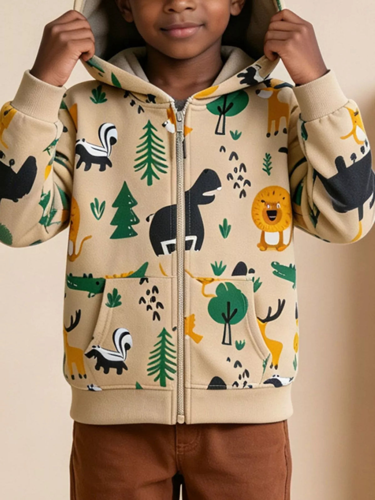 Beige forest-animal print zip-up hooded jacket worn by a child