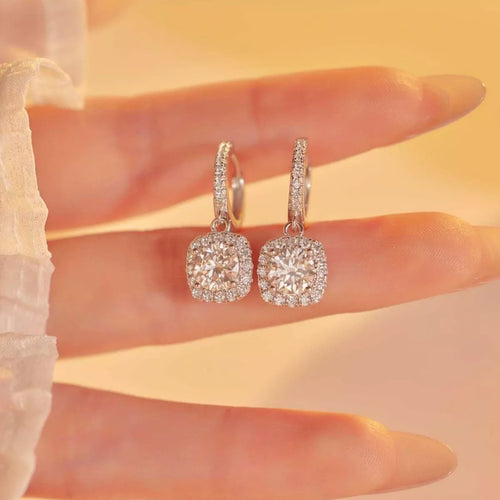 Silver-tone hoop earrings with square halo stone drops — detail view