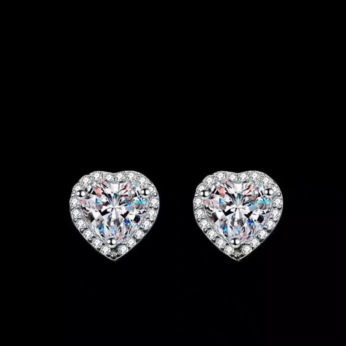 Heart-shaped clear stone halo stud earrings — detail view