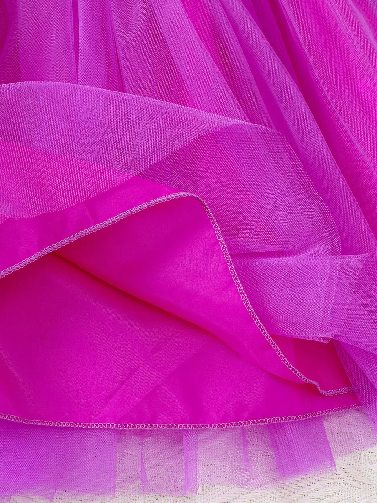 Close-up of the purple tulle skirt layers and solid lining.