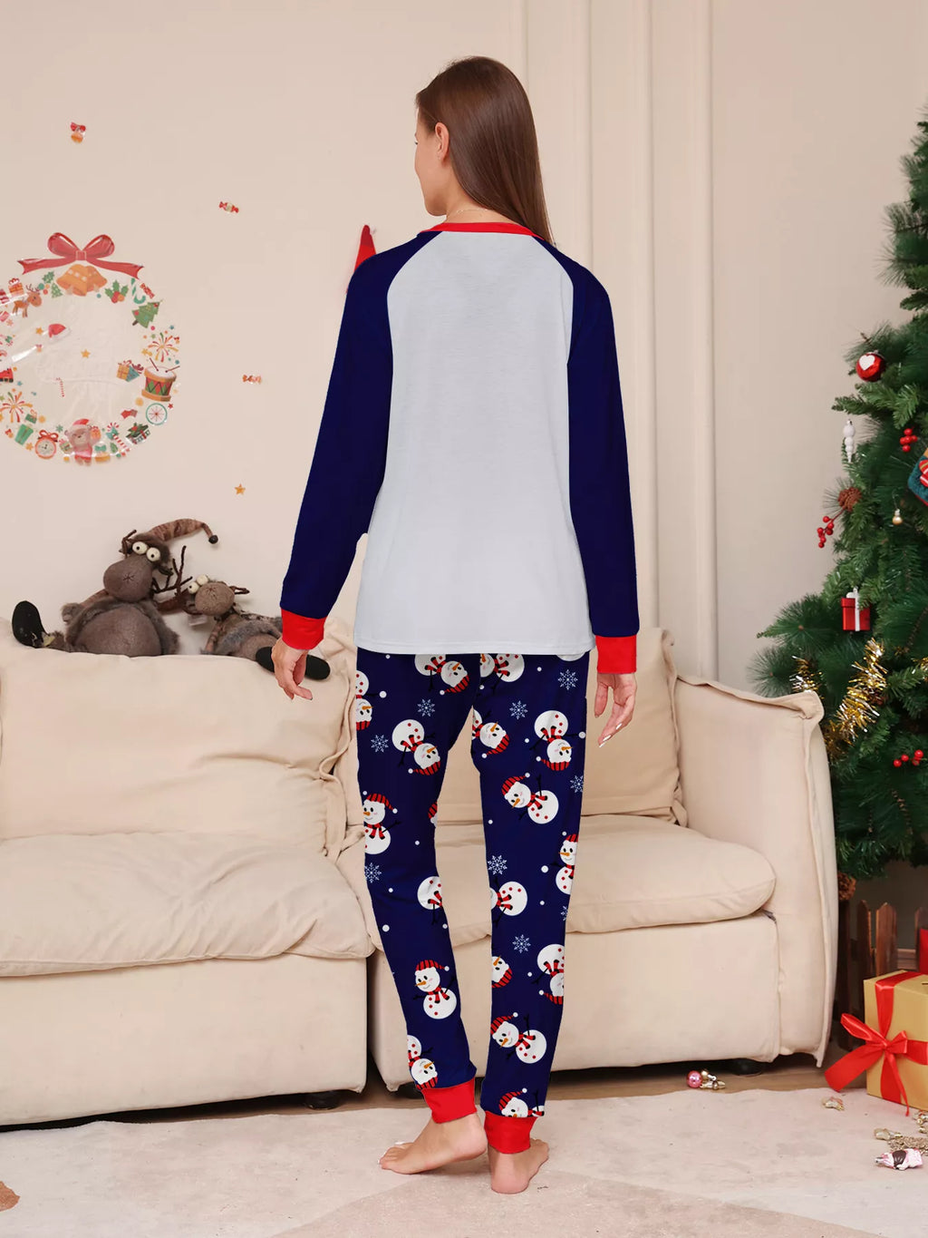 Back view of the women's white and navy top with printed pajama pants.