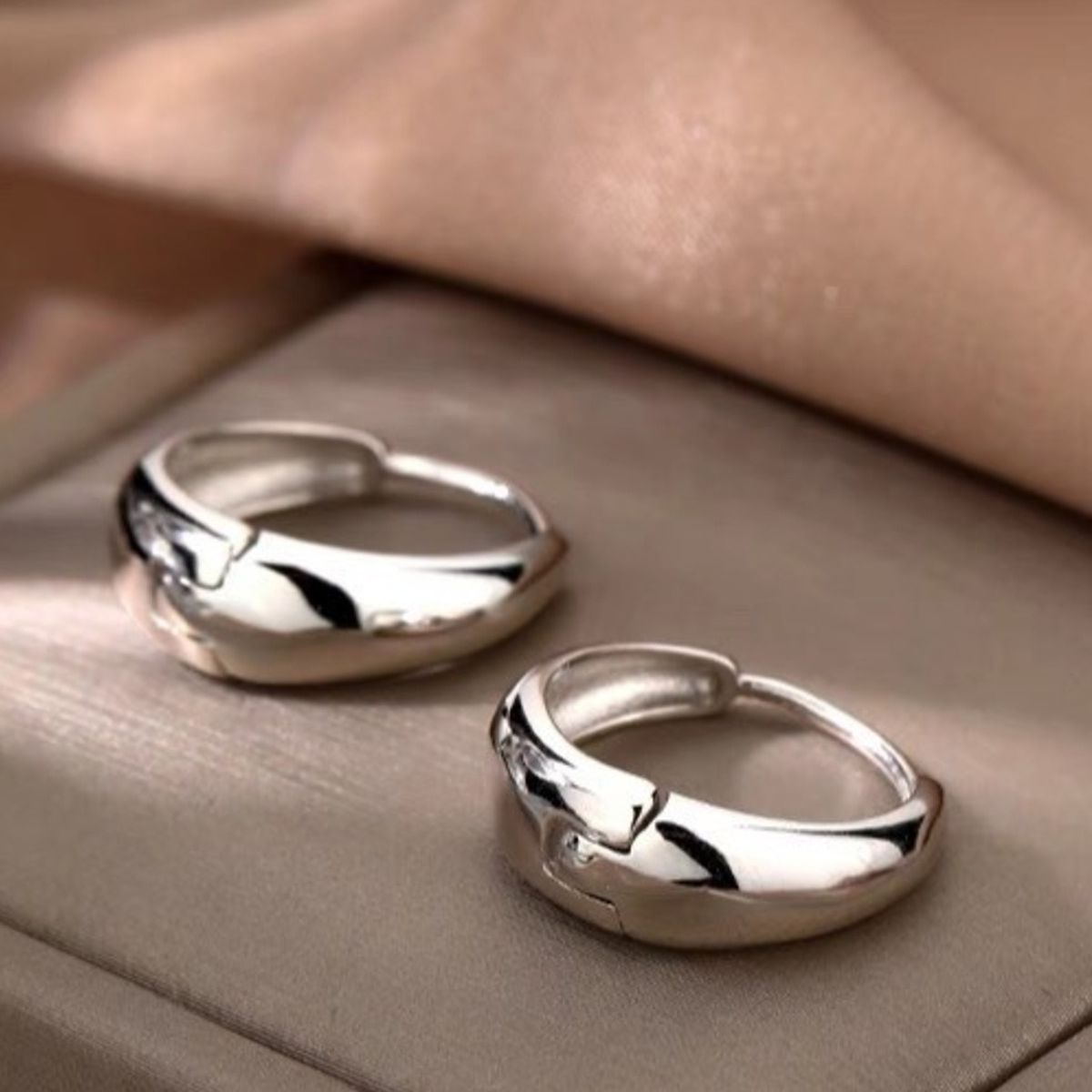 Rounded silver-tone hoop earrings