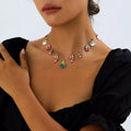 Gold-tone necklace with colorful Christmas charms