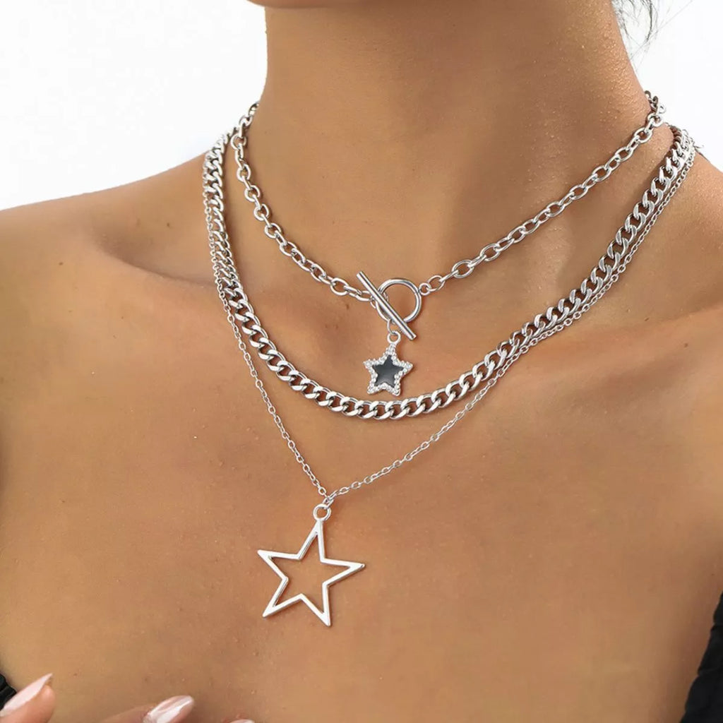 Three layered silver-tone necklaces with star pendants