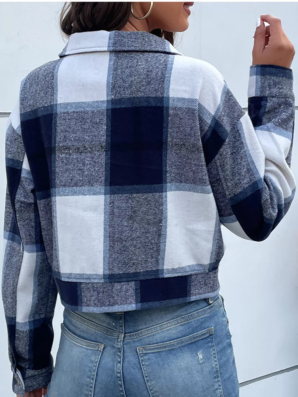 Navy color-block plaid cropped jacket with flap chest pockets, back view.