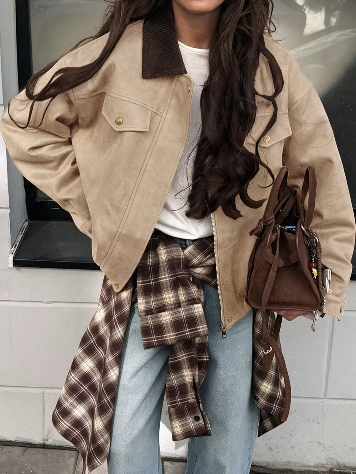 Apricot dropped-shoulder jacket worn open over a white top.