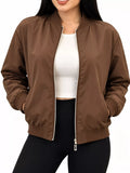 Brown bomber jacket modeled open over a white top.