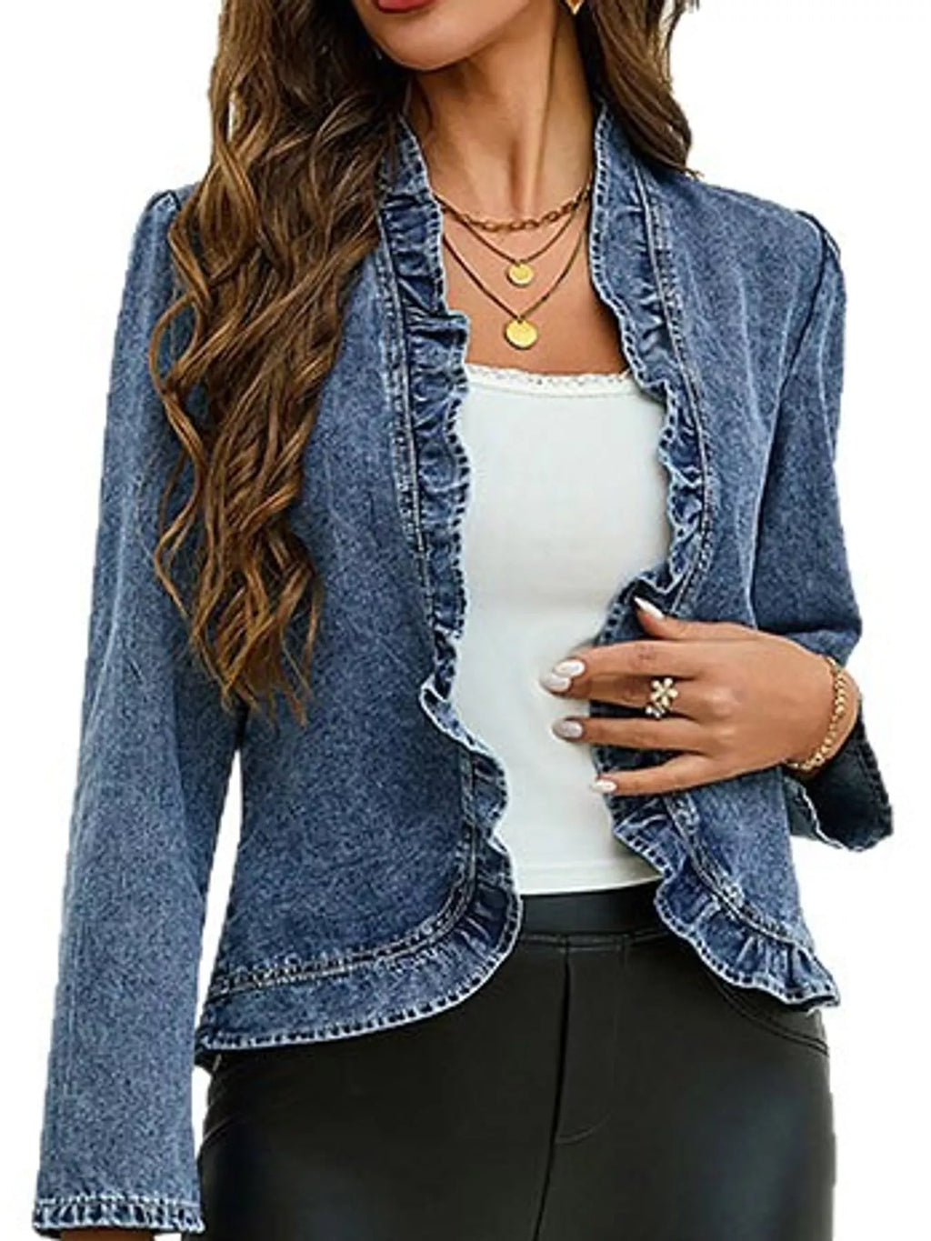 Blue ruffle-trim jacket styled open over a white top.