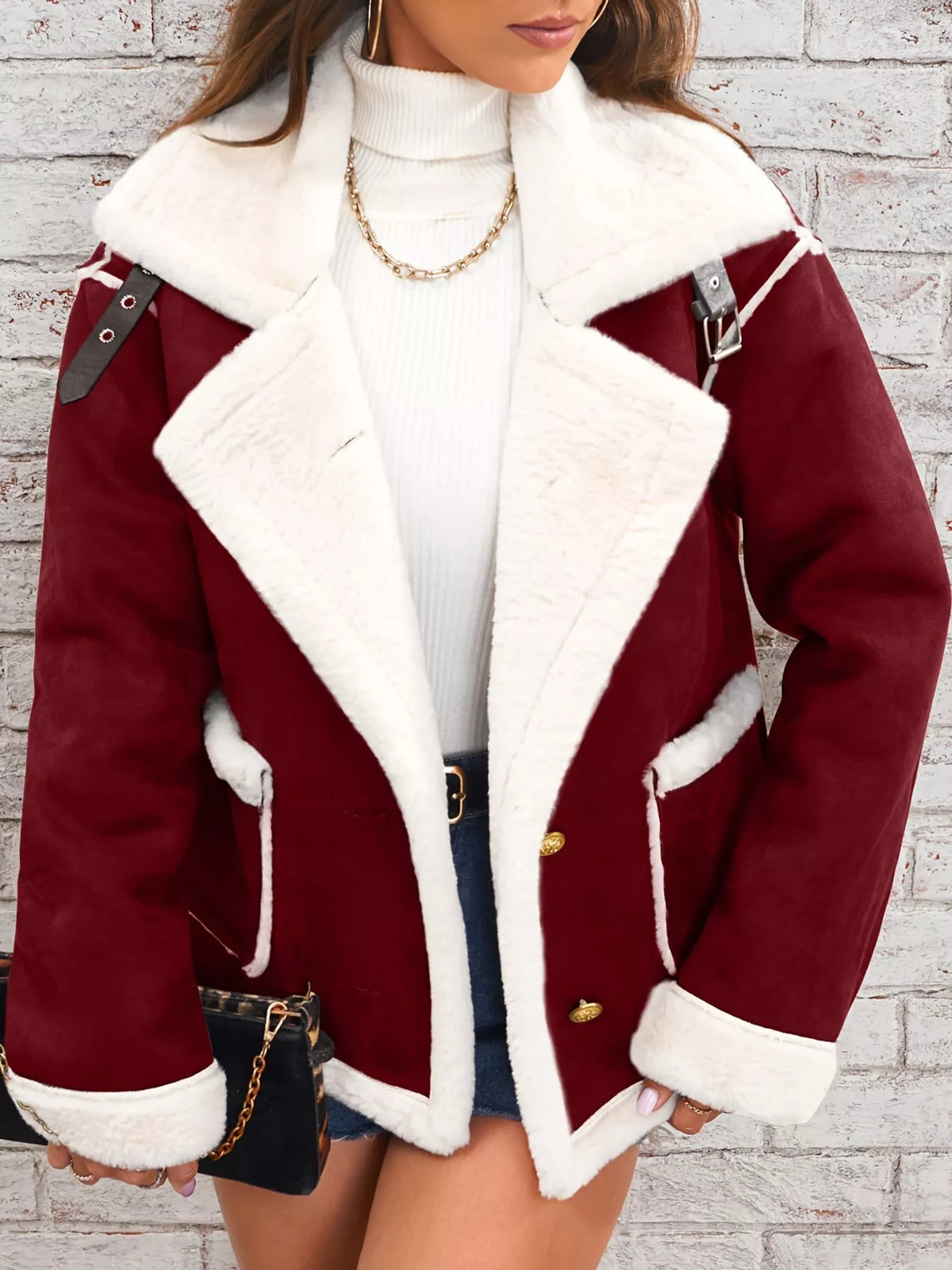 Crimson jacket with wide white plush lapels, contrast trim and front pockets, front view modeled worn open.