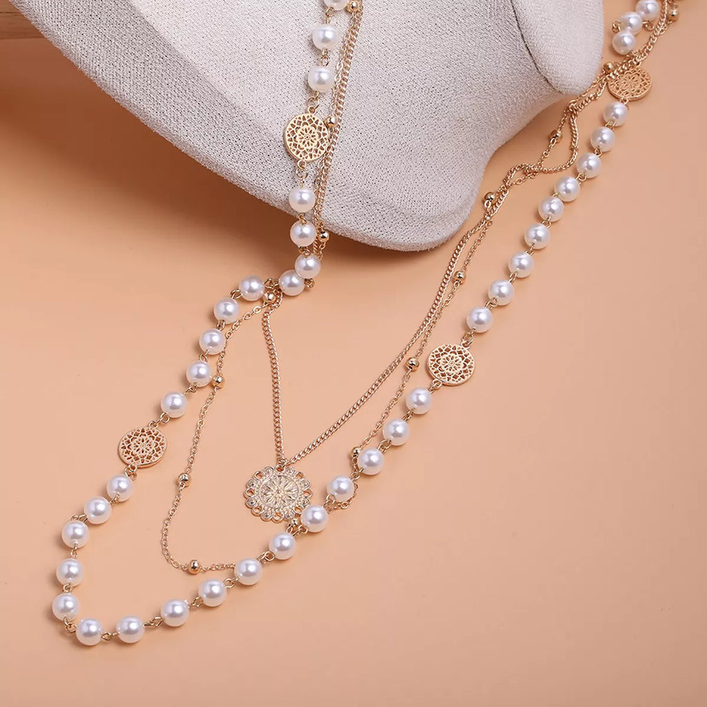 Layered pearl-like bead and coin pendant necklace — detail view