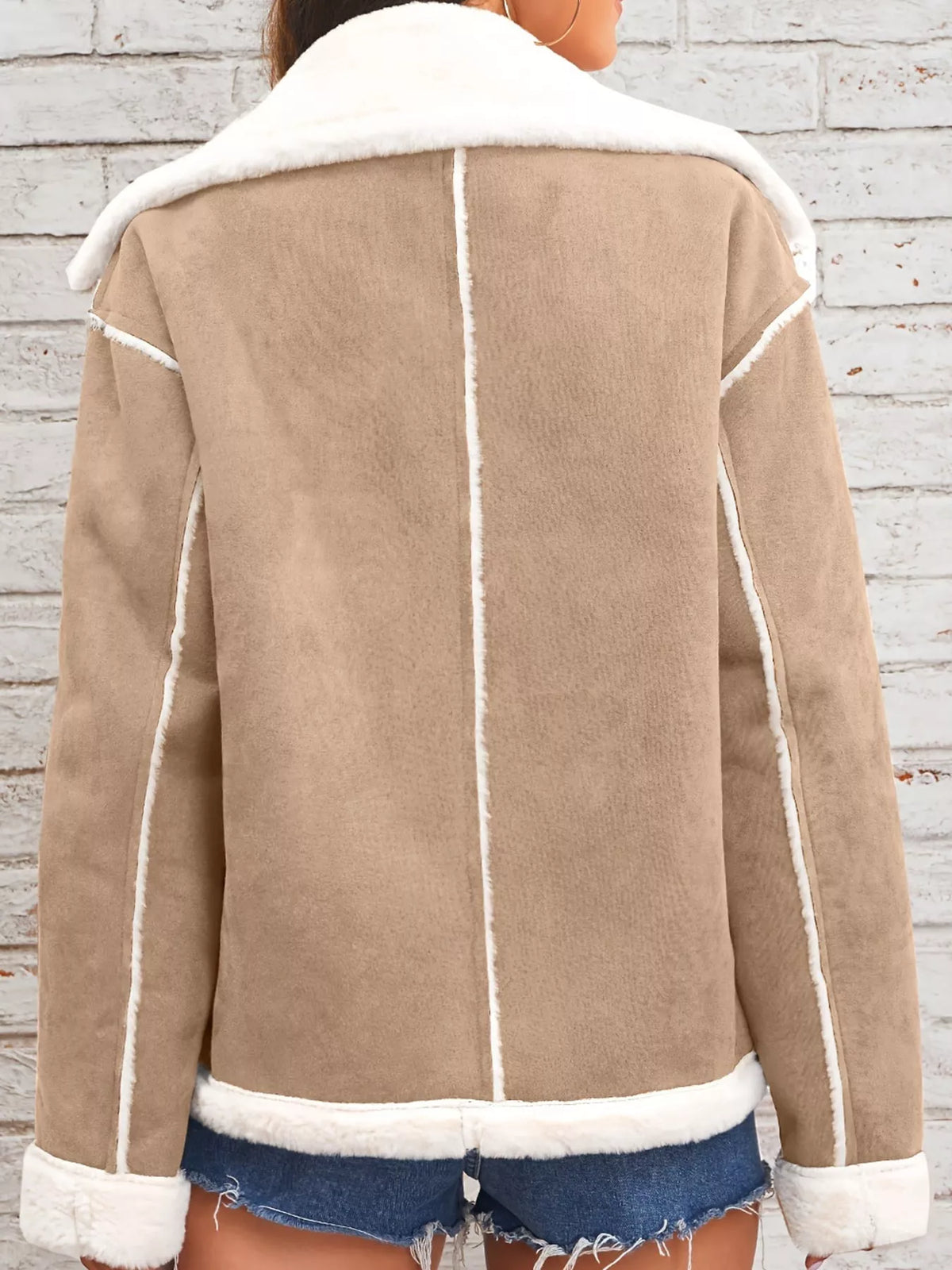 Tan jacket with wide white plush lapels, contrast trim and front pockets, back view.