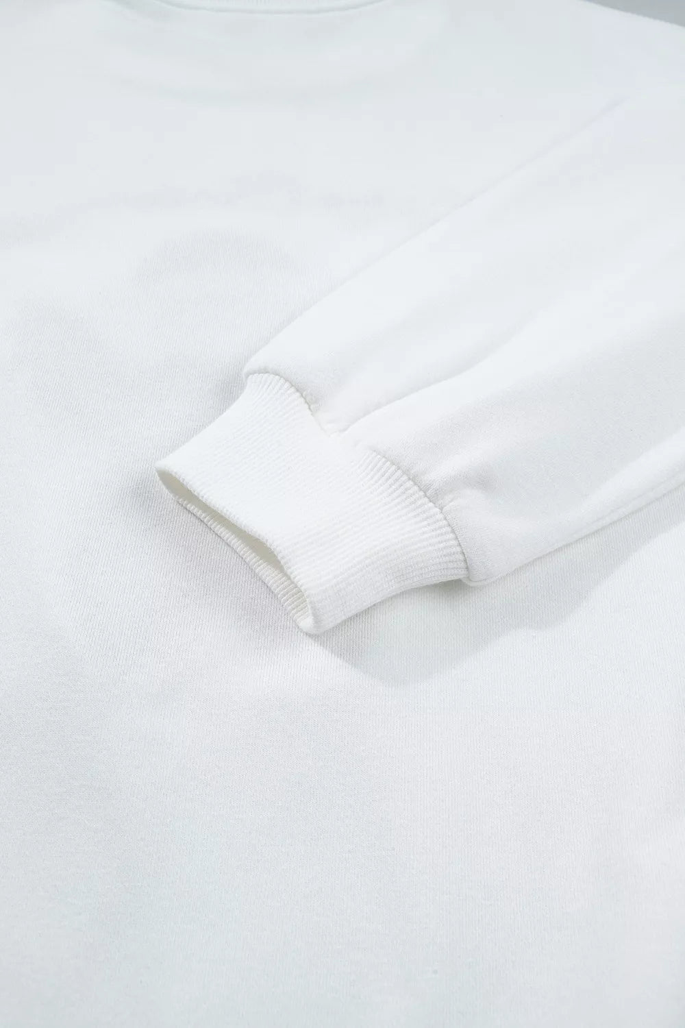 White embroidered Gingerbread Cozy Christmas Long Sleeve Round Neck Sweatshirt — detail view