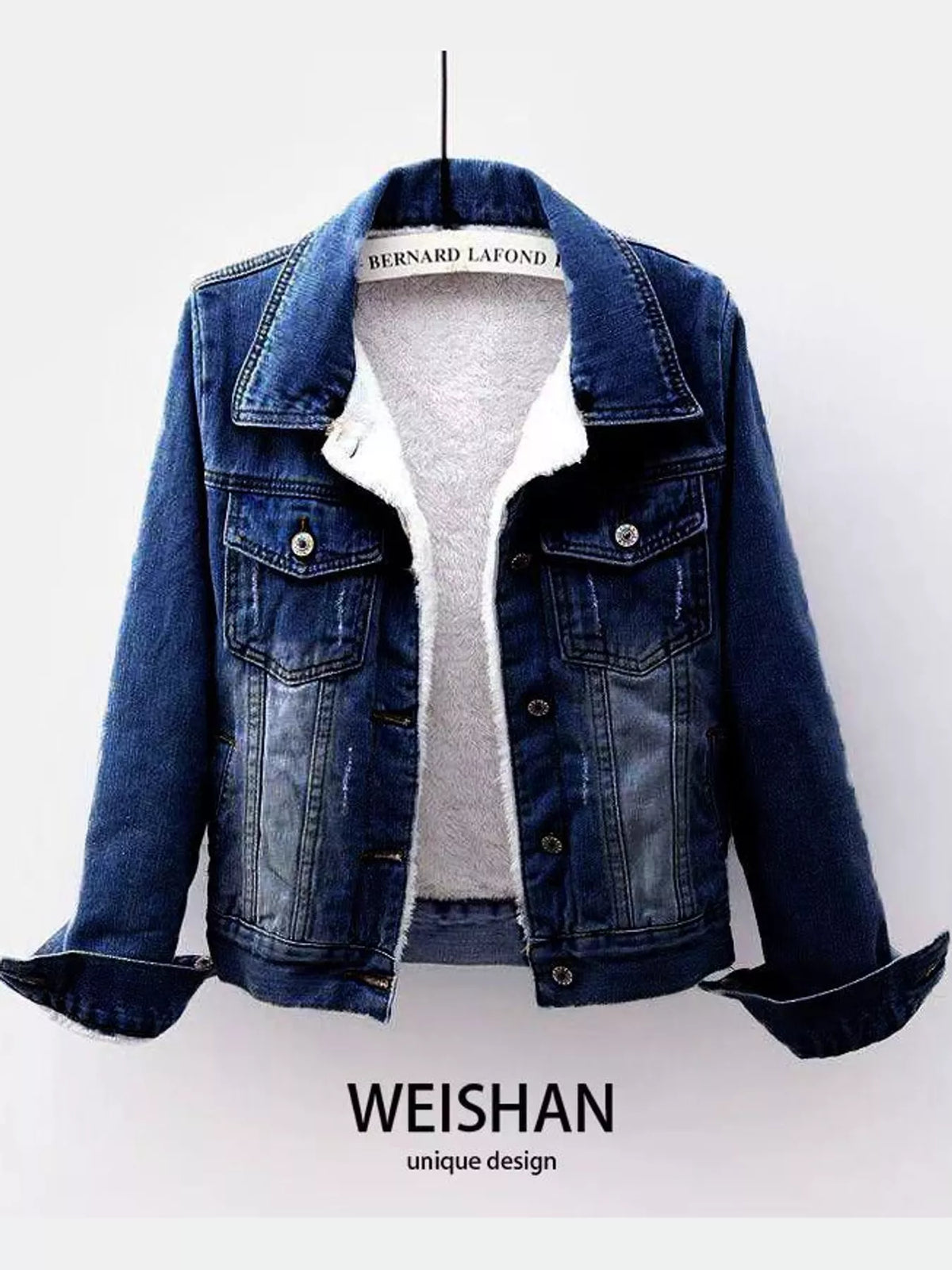 Medium-blue denim jacket with white fleece lining, front view.