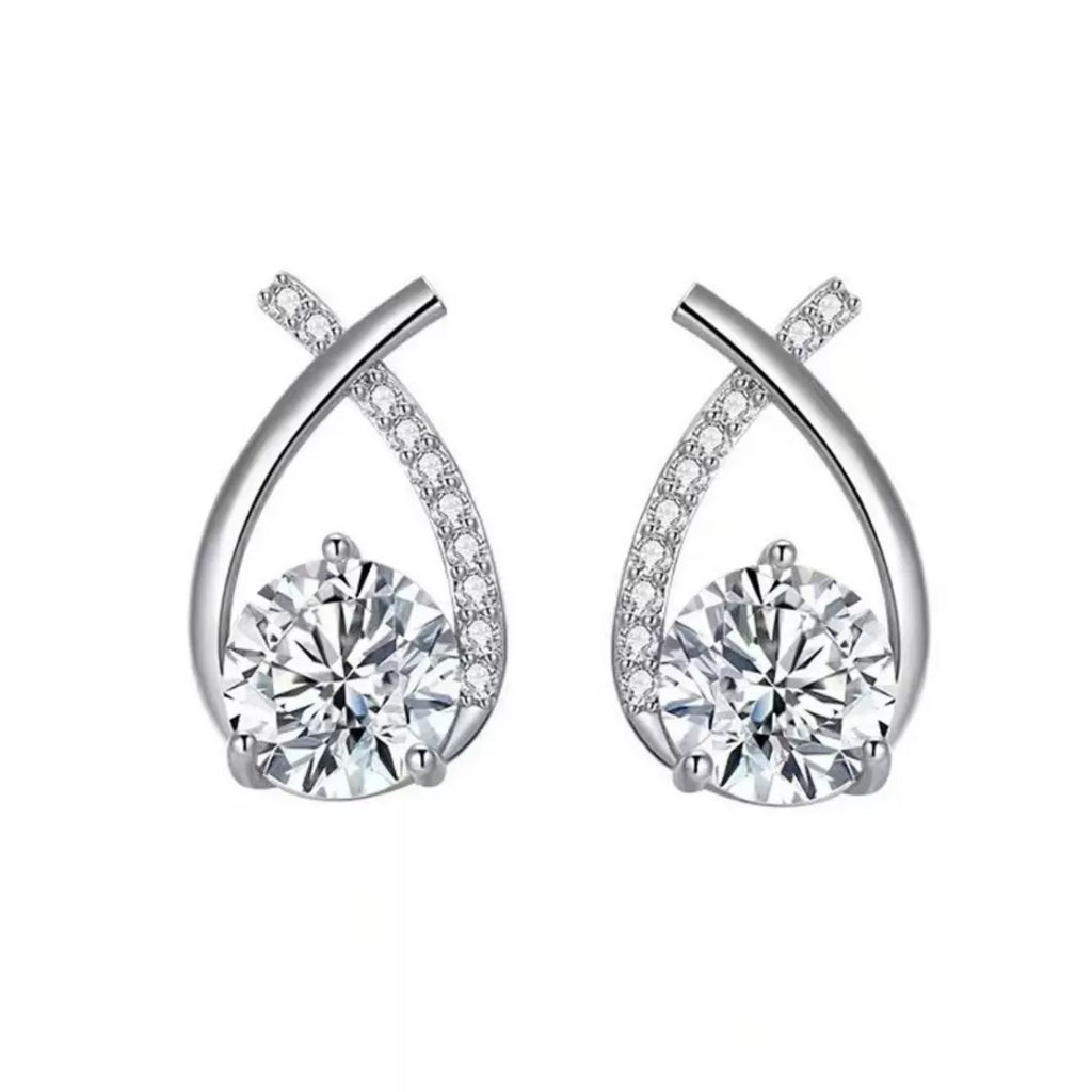 Silver-tone open teardrop earrings with round clear stones — detail view