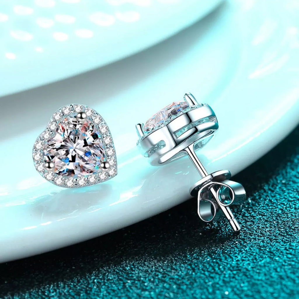 Heart-shaped clear stone halo stud earrings — detail view