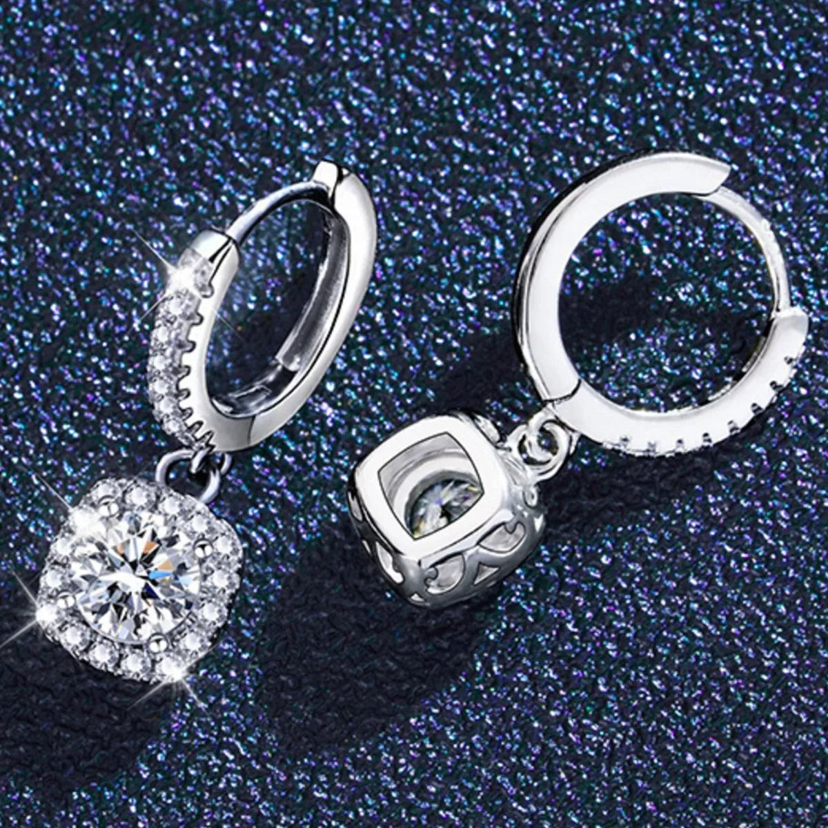 Silver-tone hoop earrings with square halo stone drops — detail view
