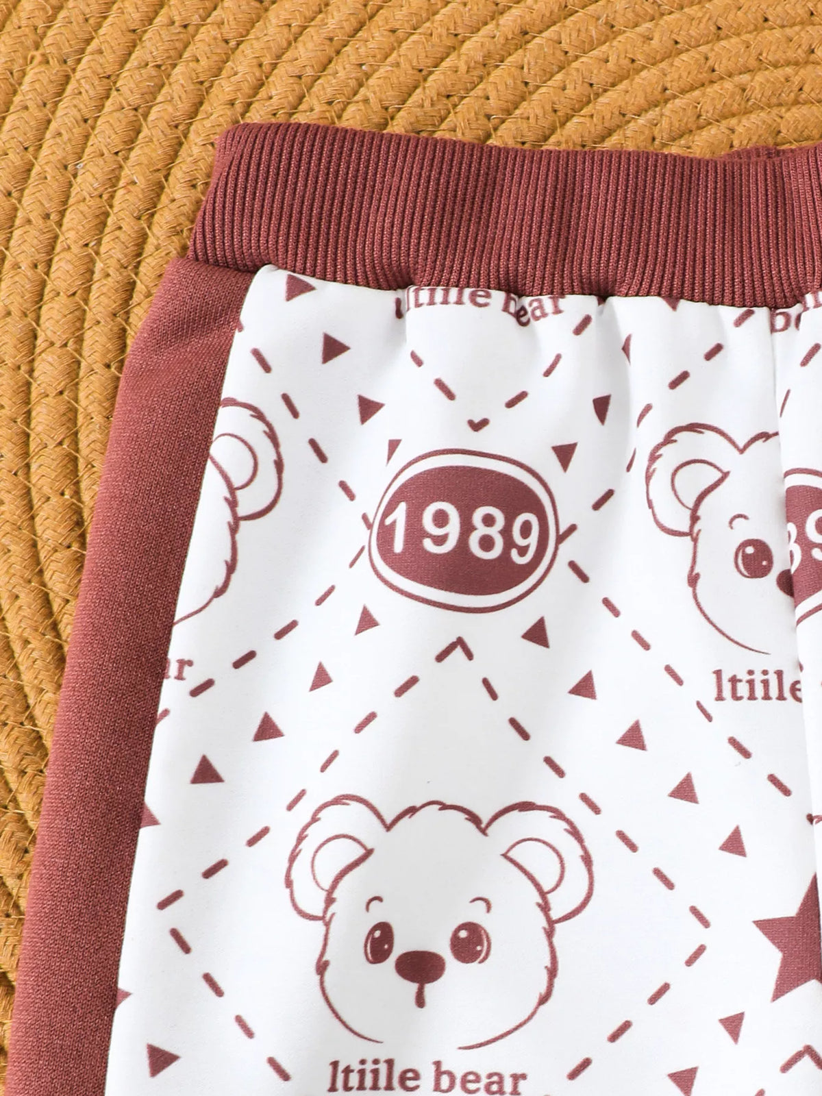 Bear print and maroon waistband on the matching pants