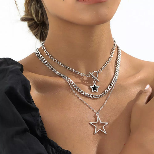 Three layered silver-tone necklaces with star pendants