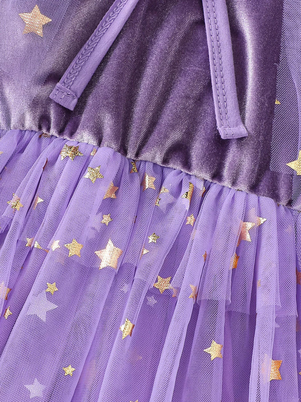 Purple waist tie and gold-star tulle skirt detail