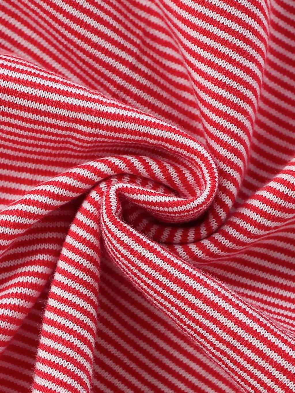 Folded red-and-white fine-striped dress fabric.