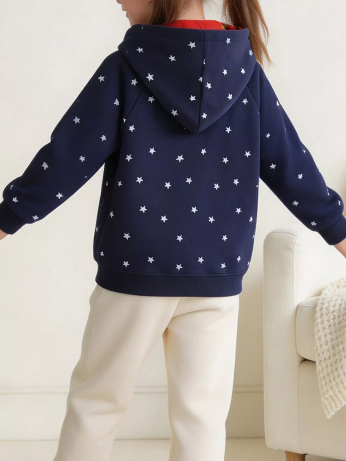 Back view of the navy star-print children's hoodie.