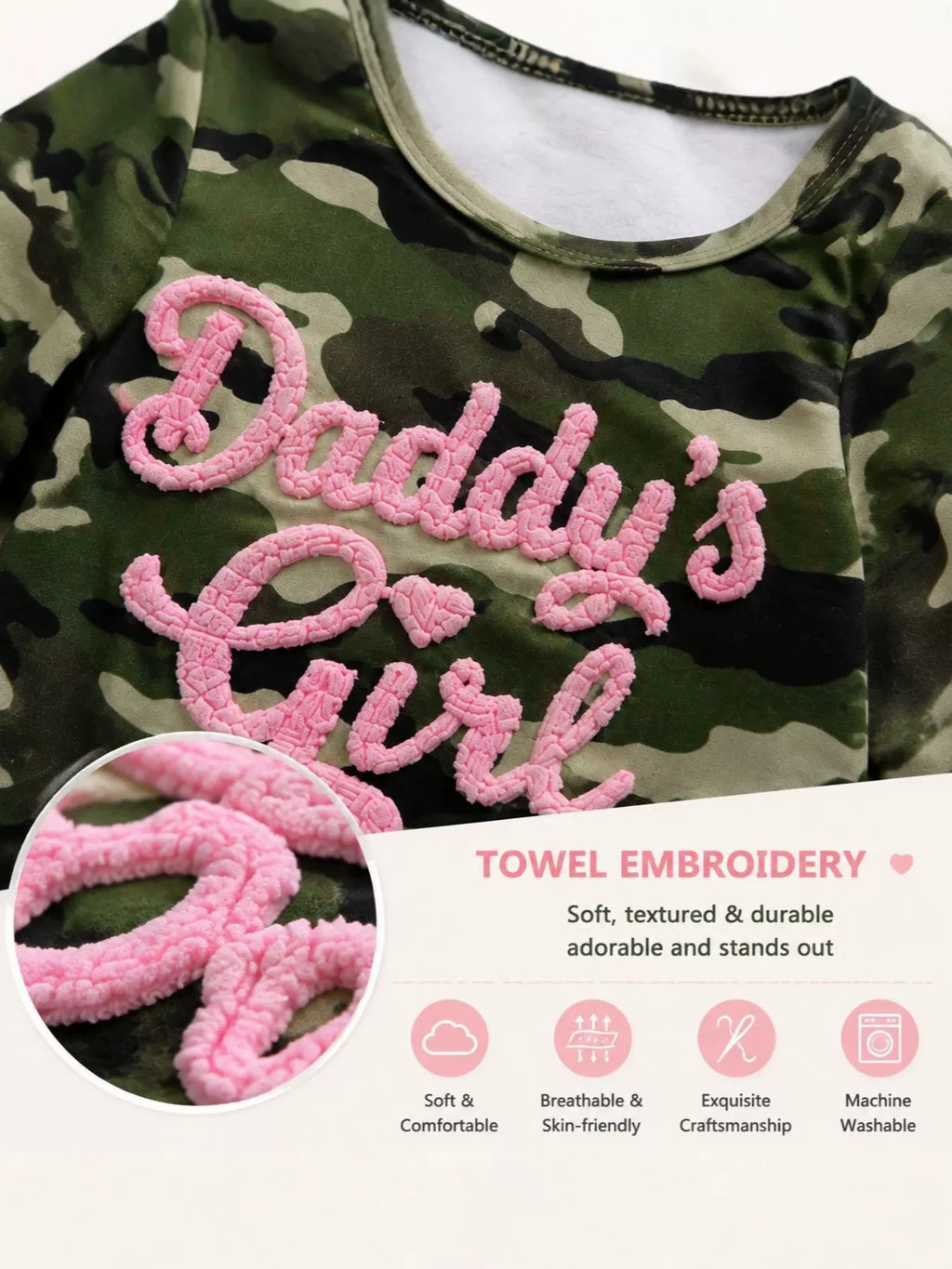 Pink Daddy’s Girl lettering and bow detail on the camouflage jumpsuit