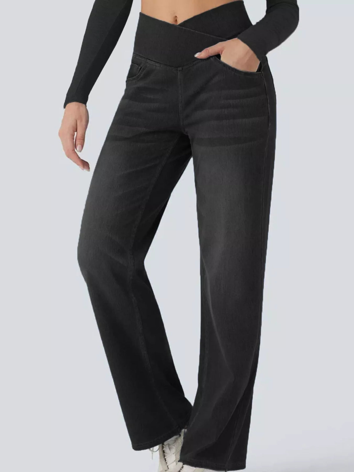 Black high-waisted crossover waistband straight-leg jeans — detail view